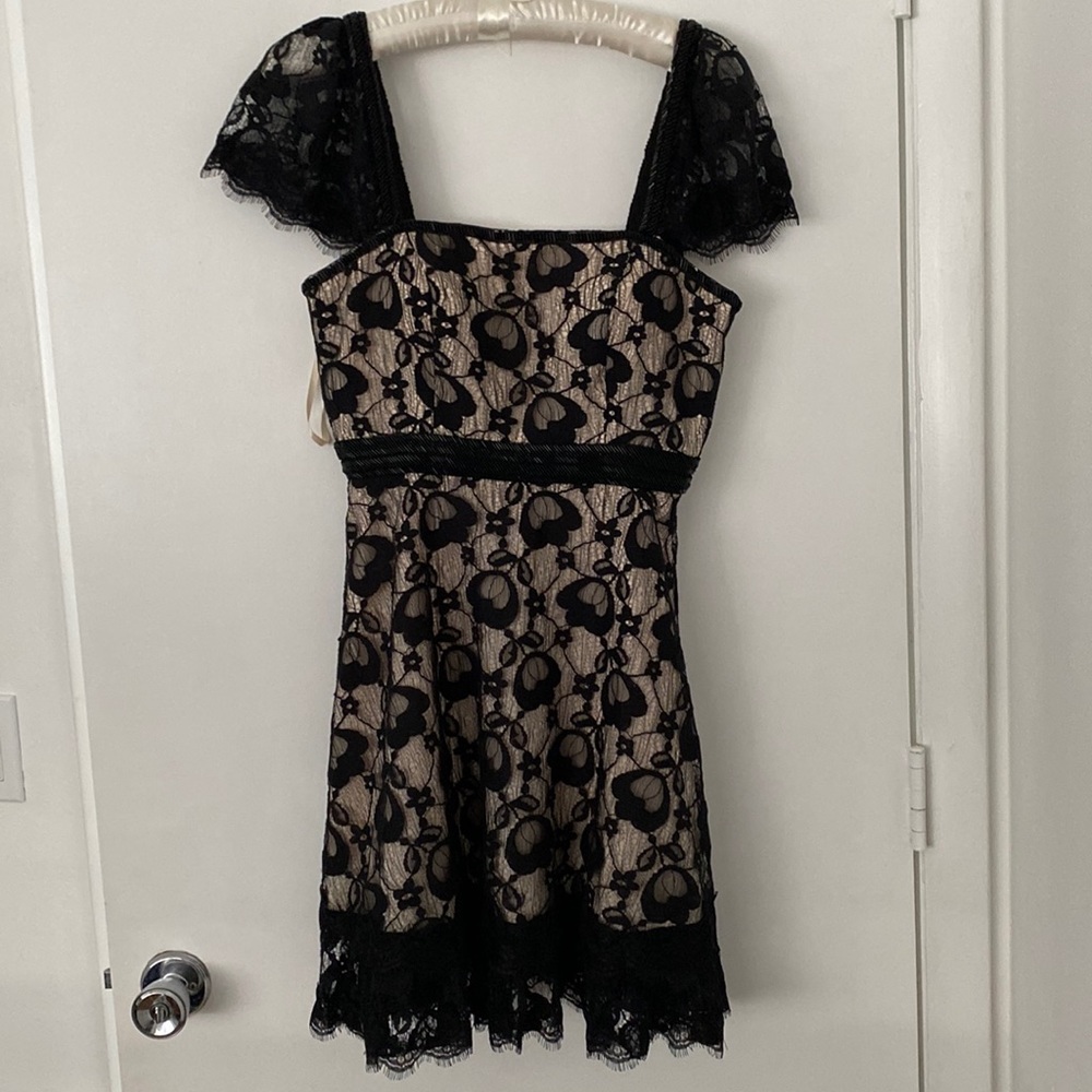 NWT BLACK LACE WITH NUDE UNDERNEATH detailed beading on shoulders and waist.